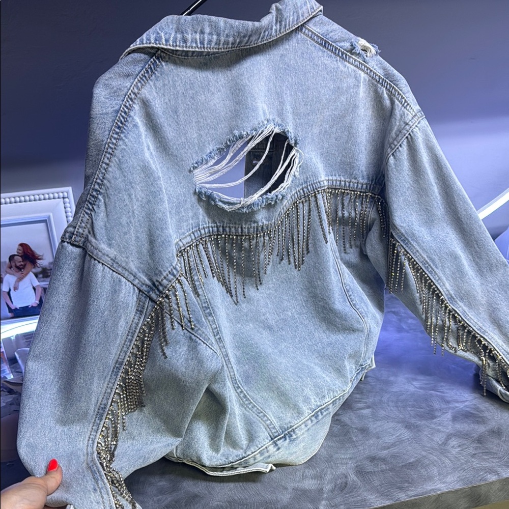 Distressed Denim Jacket with Fringe